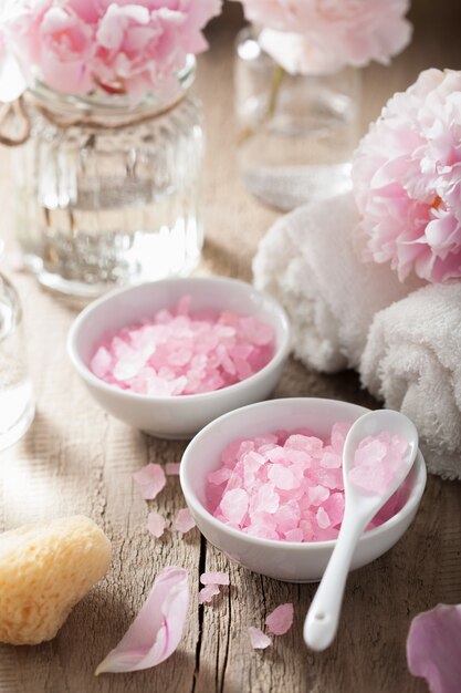 Spa set with peony flowers and pink herbal salt
