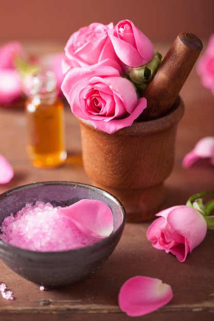 Spa set with pink rose flowers mortar and herbal salt