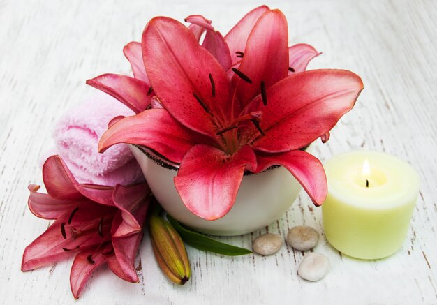 Spa setting with lily flower