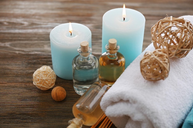 Spa still life in light blue color on wooden table closeup