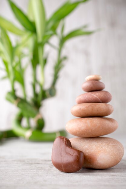 Spa stones on the grey background.