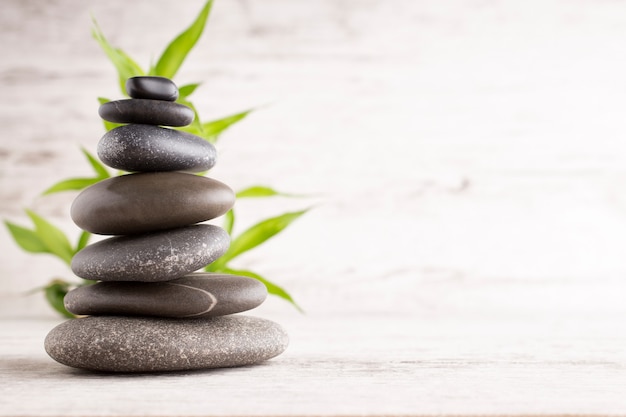 Spa stones on the grey background.