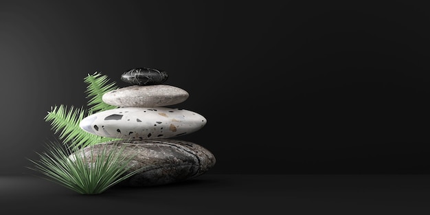 Photo spa stones with palm leaf on black studio background