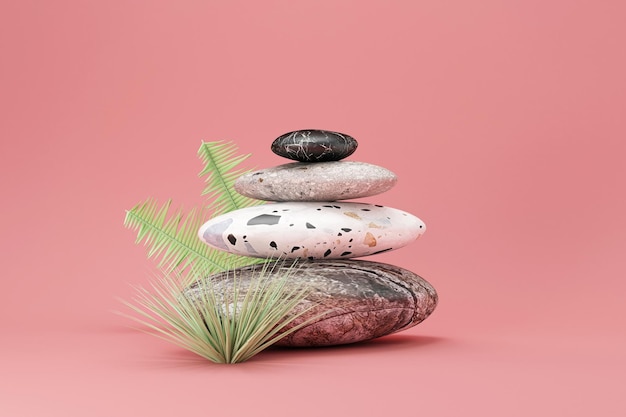 Spa stones with palm leaf on pink studio background