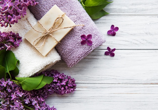 Spa towels and soap with lilac flowers