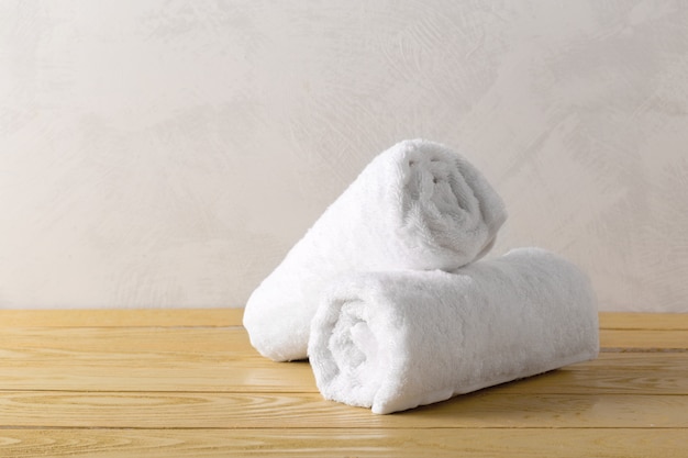 Spa towels on wooden surface