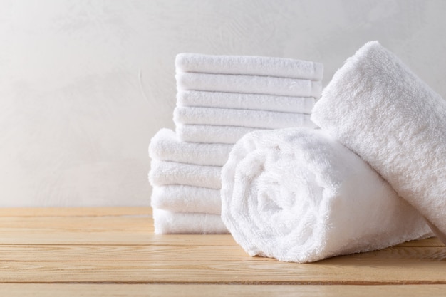 Spa towels on wooden surface