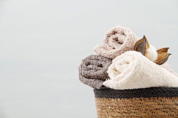 Spa and wellness composition with towels and beauty products. Wellness center, hotel, bodycare