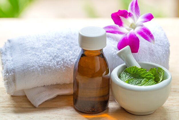 Photo spa and wellness and towels on wooden background. relax and treatment therapy.