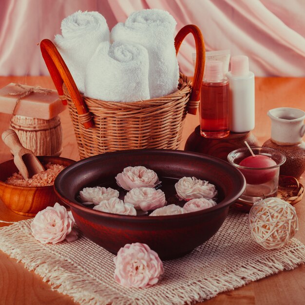 Spa with roses, manicure, relaxing bath and cosmetics