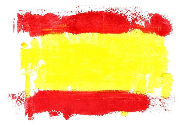 Spaanse vlag door penseelstreken geïsoleerd op de witte achtergrond