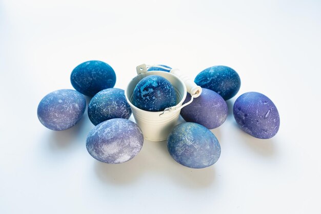 Space colored eggs on white background