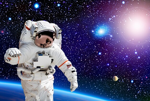 Space exploration with astronauts and distant galaxies backgrounds