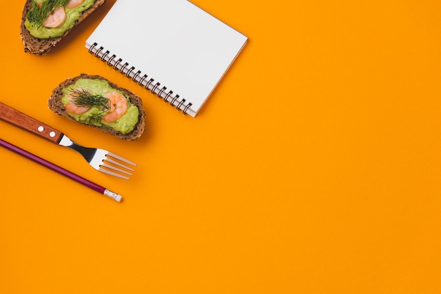 Photo space notebook bread wholegrain mashed avocado