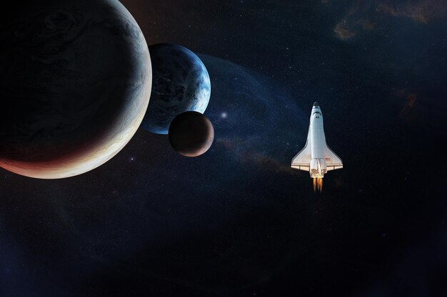 Space Shuttle in outer space with alien planets Elements of this image furnished by NASA