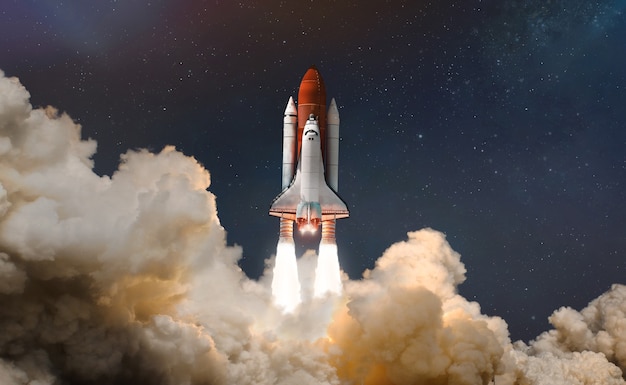 Photo space shuttle launch in the clouds to outer space elements of this image furnished by nasa