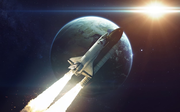 Photo space shuttle orbiting earth planet