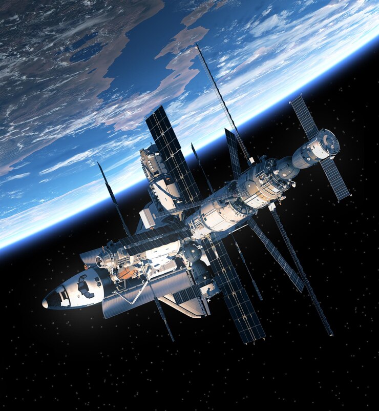 Photo space shuttle and space station orbiting earth