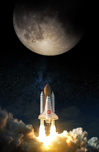 Photo space shuttle with bitcoin icon takes off to the moon. elements of this image furnished by nasa.