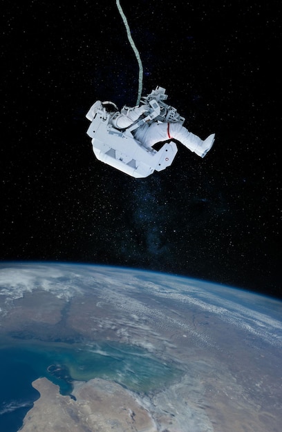 Space suits isolated on space background Elements of this image furnished by NASA