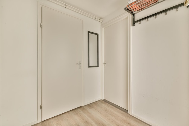 Spacious attic room with sofa and kitchen