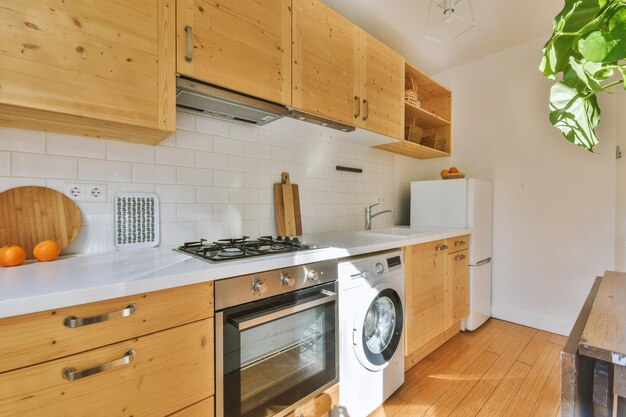 Spacious attic room with sofa and kitchen