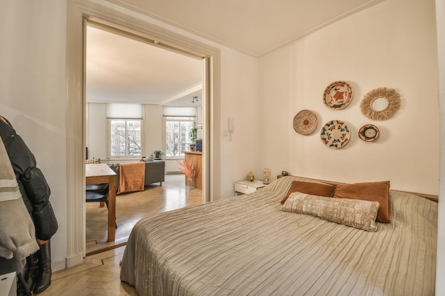 Spacious bright bedroom with a minimalist bedside table