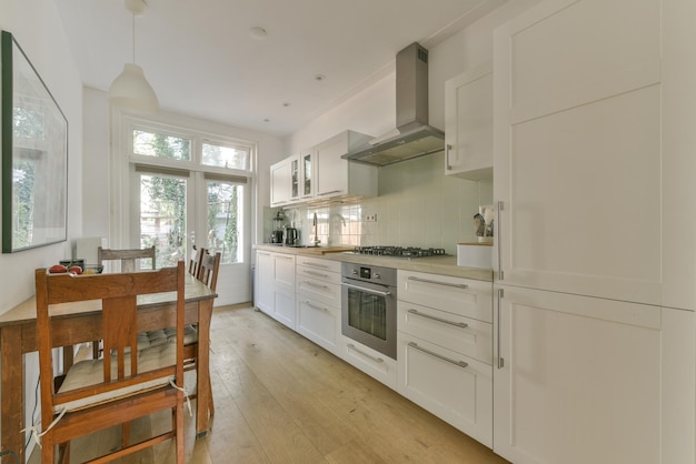 Spacious bright kitchen with dining area