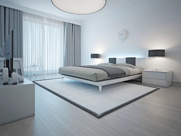 흰색 카펫과 밝은 회색 벽 및 가구가있는 넓고 현대적인 스타일의 침실입니다.