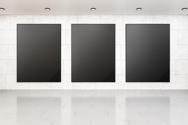 Spacious gallery room with three blank posters