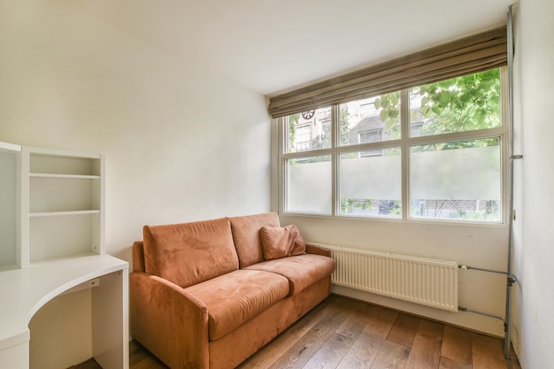 Spacious room with working desk and settee