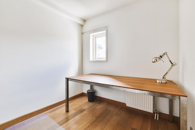 Spacious study room with table and shelves