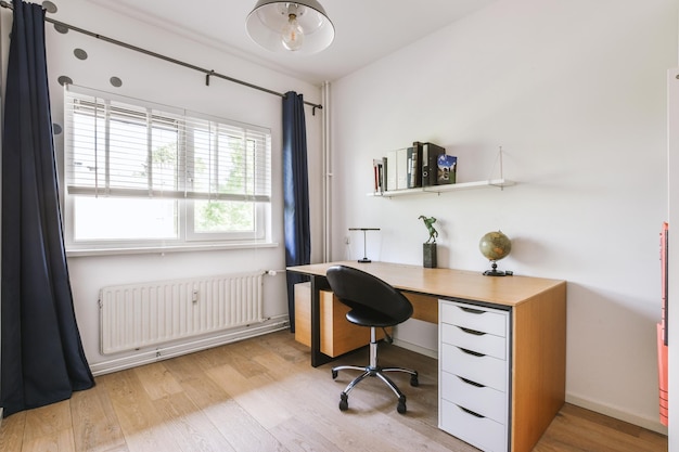 Spacious study room with table and shelves