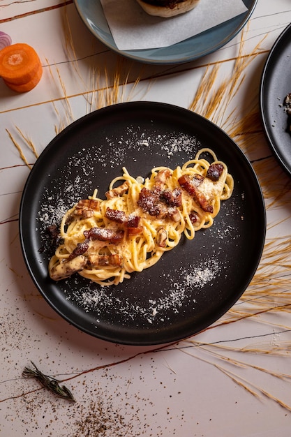 spaghetti and accessories on white background