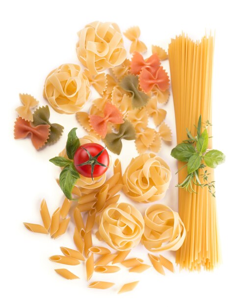 Spaghetti and basil isolated on white background.