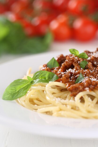 Spaghetti Bolognese or Bolognaise noodles pasta with basil