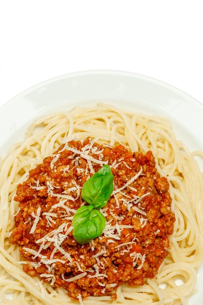 Spaghetti bolognese on a white plate