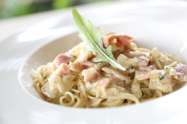 Spaghetti carbonara white sauce with bacon and cheese