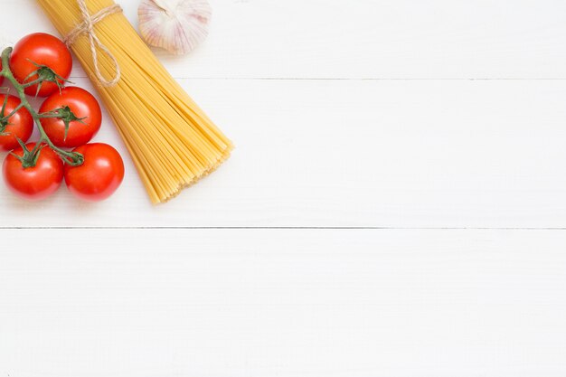 Spaghetti ingredients concept on white background