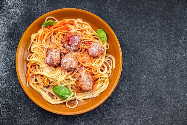 spaghetti meatballs tomato sauce pasta dish meal food snack on the table copy space food