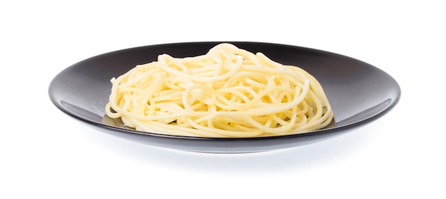 Spaghetti pasta in a dish isolated on white background