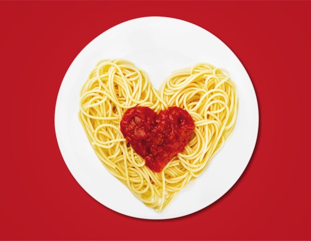 Spaghetti pasta in heart shape on  table.