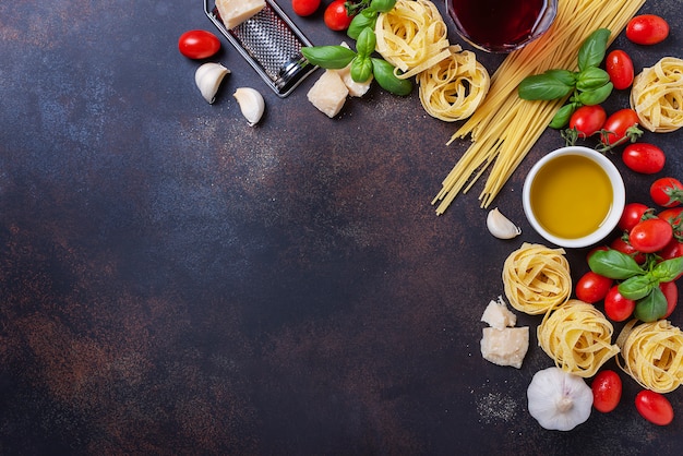 Spaghetti, tagliatelle, tomato, basil, cheese, garlic and wine