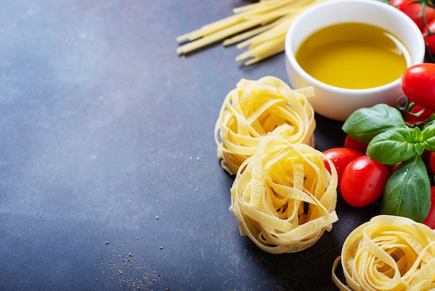 Spaghetti, tagliatelle, tomato, basil, cheese, garlic and wine