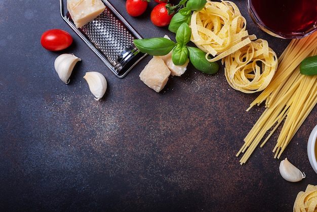 Spaghetti, tagliatelle, tomato, basil, cheese, garlic and wine