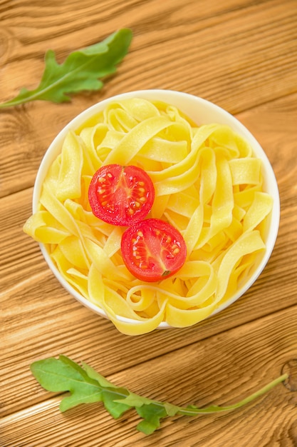 Spaghetti tagliatelle with cherry tomato