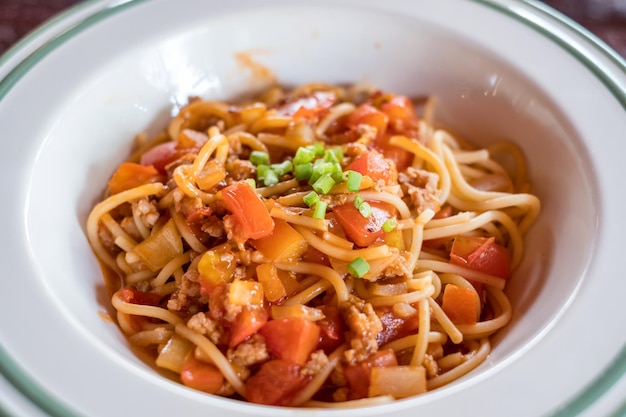 Spaghetti tomato sauce with pork and vegetable