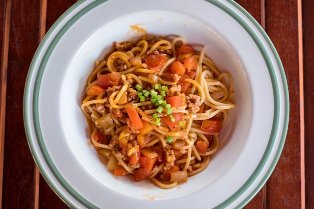 Spaghetti tomato sauce with pork and vegetable