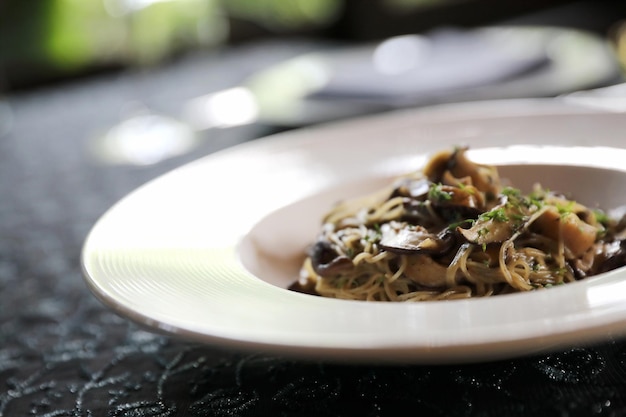 Spaghetti truffle cream sauce with mushroom