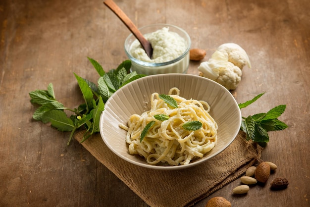 Spaghetti with cauliflower pesto with almond and mint